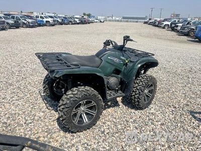 Czwarte zdjęcie samochodu z boku: 2011 YAMAHA GRIZZLY ATV VIN:JY4AM13Y5BC036363 - miniatura