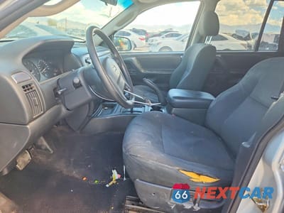Zdjęcie 7 z 14 samochodu: 2002 JEEP GRAND CHEROKEE LAREDO VIN:1J4GW48S72C249997 - miniatura