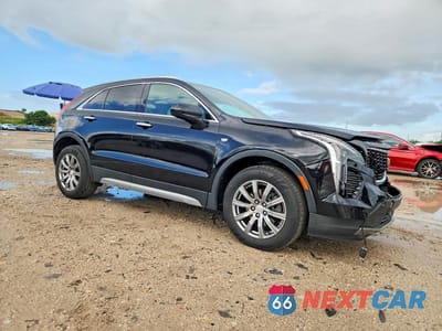 Czwarte zdjęcie samochodu z boku: 2020 CADILLAC XT4 PREMIUM LUXURY VIN:1GYFZCR41LF021197 - miniatura