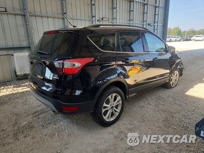 Trzecie zdjęcie samochodu z tyłu: 2018 FORD ESCAPE SE VIN:1FMCU9GD3JUA21509 - miniatura
