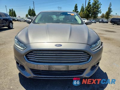 Piąte zdjęcie samochodu w środku: 2014 FORD FUSION SE PHEV VIN:3FA6P0PUXER256237 - miniatura