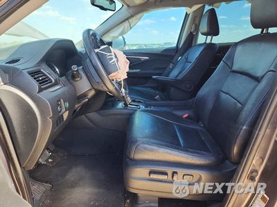 Zdjęcie 7 z 13 samochodu: 2017 HONDA PILOT EXL VIN:5FNYF5H89HB043970 - miniatura