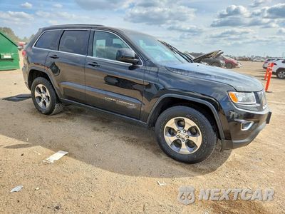 Czwarte zdjęcie samochodu z boku: 2014 JEEP GRAND CHEROKEE LAREDO VIN:1C4RJFAG0EC583565 - miniatura