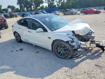Czwarte zdjęcie samochodu z boku: 2023 TESLA MODEL 3 VIN:5YJ3E1EA7PF568957 - miniatura