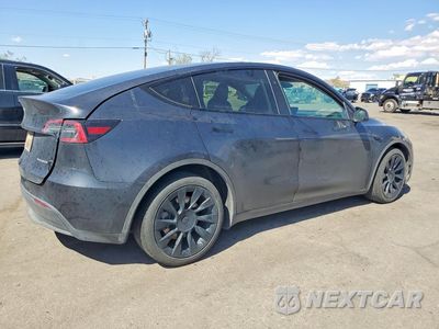 Trzecie zdjęcie samochodu z tyłu: 2024 TESLA MODEL Y VIN:7SAYGAEE2RF068004 - miniatura