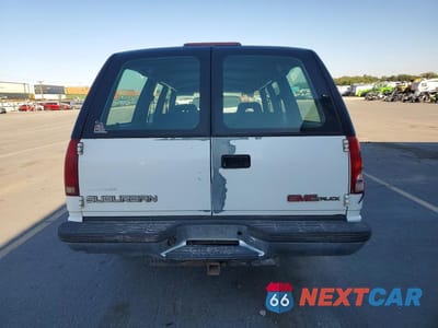 Zdjęcie 6 z 13 samochodu: 1994 GMC SUBURBAN C1500 VIN:1GKEC16K5RJ703455 - miniatura