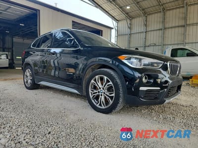 Czwarte zdjęcie samochodu z boku: 2017 BMW X1 XDRIVE28I VIN:WBXHT3Z34H4A55165 - miniatura