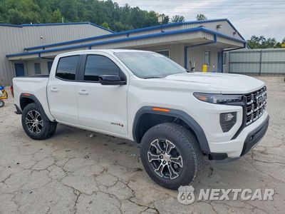Czwarte zdjęcie samochodu z boku: 2024 GMC CANYON AT4 VIN:1GTP6DEK7R1266024 - miniatura