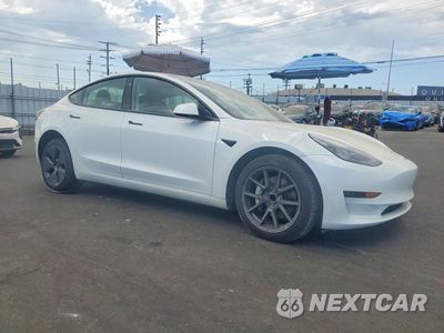Czwarte zdjęcie samochodu z boku: 2023 TESLA MODEL 3 VIN:5YJ3E1EA4PF512278 - miniatura