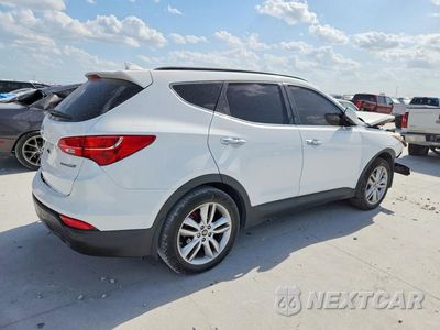 Trzecie zdjęcie samochodu z tyłu: 2014 HYUNDAI SANTA FE SPORT 2.0T VIN:5XYZU3LA8EG228301 - miniatura