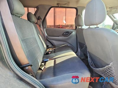 Zdjęcie 11 z 13 samochodu: 2002 FORD ESCAPE XLT VIN:1FMYU03182KE08700 - miniatura