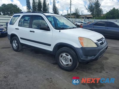 Czwarte zdjęcie samochodu z boku: 2004 HONDA CR-V LX VIN:SHSRD78474U223597 - miniatura