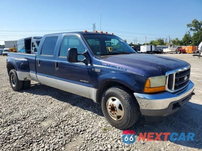 Czwarte zdjęcie samochodu z boku: 2001 FORD F350 SUPER DUTY VIN:1FTWW32F71EC35415 - miniatura