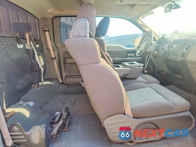 Zdjęcie 10 z 12 samochodu: 2006 FORD F150 VIN:1FTVX12506NA58556 - miniatura