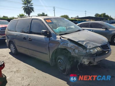 Czwarte zdjęcie samochodu z boku: 2000 HONDA ODYSSEY LX VIN:2HKRL1859YH562773 - miniatura