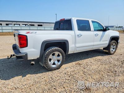 Trzecie zdjęcie samochodu z tyłu: 2014 CHEVROLET SILVERADO K1500 LTZ VIN:3GCUKSEJ6EG520215 - miniatura