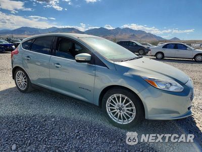 Czwarte zdjęcie samochodu z boku: 2013 FORD FOCUS BEV VIN:1FADP3R41DL235439 - miniatura