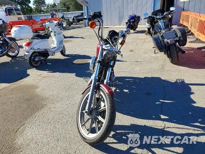 Czwarte zdjęcie samochodu z boku: 1989 HARLEY-DAVIDSON XLH883 H VIN:1HD4CEM39KY114303 - miniatura