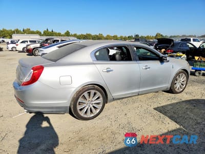 Trzecie zdjęcie samochodu z tyłu: 2013 LINCOLN MKS VIN:1LNHL9FT0DG610036 - miniatura