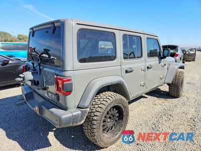 Trzecie zdjęcie samochodu z tyłu: 2018 JEEP WRANGLER UNLIMITED SAHARA VIN:1C4HJXEG7JW271795 - miniatura