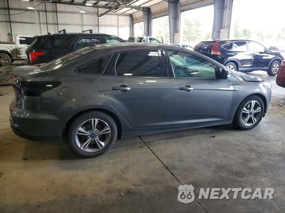 Trzecie zdjęcie samochodu z tyłu: 2017 FORD FOCUS SE VIN:1FADP3FE7HL303603 - miniatura