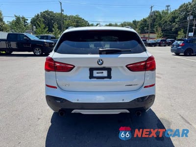 Zdjęcie 6 z 12 samochodu: 2018 BMW X1 SDRIVE28I MSPT VIN:WBXHU7C33J5L09376 - miniatura