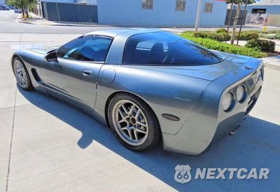 Czwarte zdjęcie samochodu z boku: 2004 CHEVROLET CORVETTE VIN:1G1YY22G845113763 - miniatura