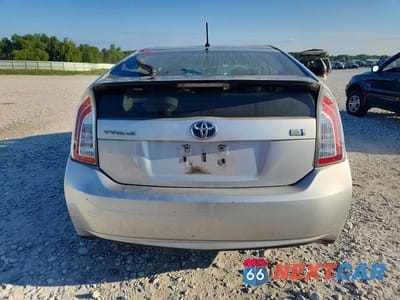 Zdjęcie 6 z 12 samochodu: 2013 TOYOTA PRIUS TWO VIN:JTDKN3DU3D5663368 - miniatura