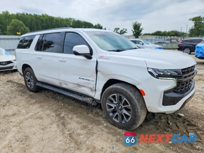 Czwarte zdjęcie samochodu z boku: 2024 CHEVROLET SUBURBAN K1500 Z71 VIN:1GNSKDKD0RR114039 - miniatura