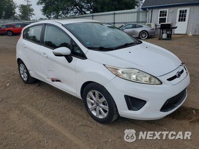 Czwarte zdjęcie samochodu z boku: 2013 FORD FIESTA SE VIN:3FADP4EJ8DM136746 - miniatura