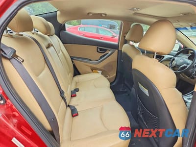 Zdjęcie 10 z 13 samochodu: 2012 HYUNDAI ELANTRA LIMITED VIN:KMHDH4AE7CU342601 - miniatura