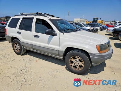 Czwarte zdjęcie samochodu z boku: 1999 JEEP GRAND CHEROKEE LAREDO VIN:1J4GW58S9XC682248 - miniatura