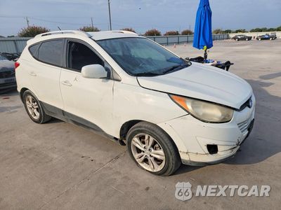 Czwarte zdjęcie samochodu z boku: 2011 HYUNDAI TUCSON GLS VIN:KM8JU3AC9BU220599 - miniatura