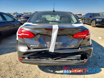 Zdjęcie 6 z 12 samochodu: 2018 FORD FOCUS SE VIN:1FADP3F2XJL261097 - miniatura