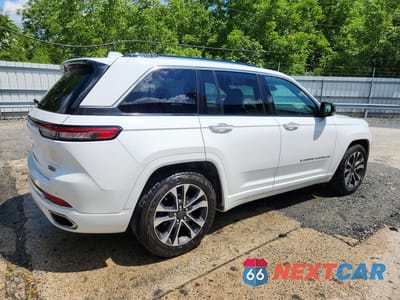 Trzecie zdjęcie samochodu z tyłu: 2022 JEEP GRAND CHEROKEE OVERLAND VIN:1C4RJHDG7N8540240 - miniatura