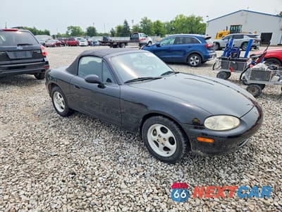 Czwarte zdjęcie samochodu z boku: 1999 MAZDA MX-5 MIATA VIN:JM1NB3533X0102407 - miniatura