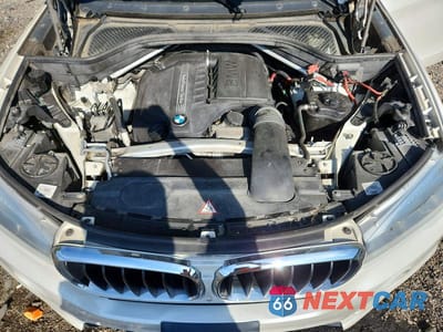 Zdjęcie 12 z 13 samochodu: 2014 BMW X5 XDRIVE35I VIN:5UXKR0C53E0H18351 - miniatura