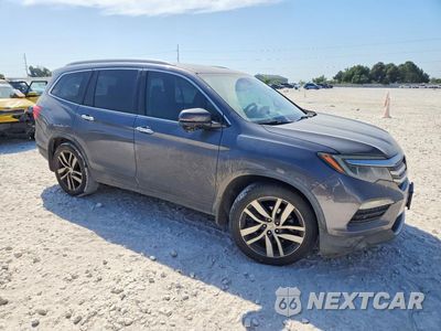 Czwarte zdjęcie samochodu z boku: 2016 HONDA PILOT TOURING VIN:5FNYF6H98GB081154 - miniatura