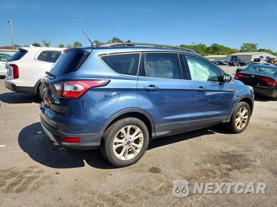 Trzecie zdjęcie samochodu z tyłu: 2018 FORD ESCAPE SE VIN:1FMCU9GD6JUC58558 - miniatura