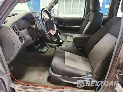 Zdjęcie 7 z 12 samochodu: 2011 FORD RANGER SUPER CAB VIN:1FTKR1ED1BPA10207 - miniatura