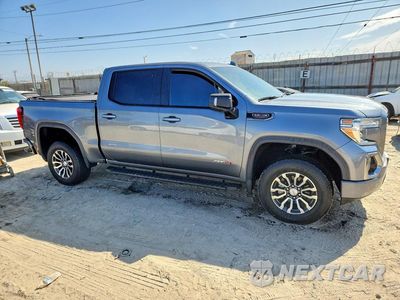 Czwarte zdjęcie samochodu z boku: 2021 GMC SIERRA K1500 AT4 VIN:3GTP9EEL8MG103690 - miniatura