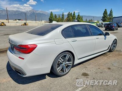 Trzecie zdjęcie samochodu z tyłu: 2019 BMW 740 I VIN:WBA7E2C56KB218306 - miniatura