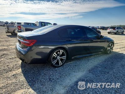 Trzecie zdjęcie samochodu z tyłu: 2017 BMW 750 I VIN:WBA7F0C36HGM21935 - miniatura