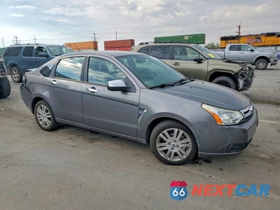 Czwarte zdjęcie samochodu z boku: 2009 FORD FOCUS SEL VIN:1FAHP37N69W200611 - miniatura