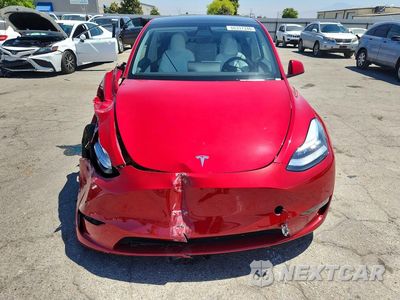 Piąte zdjęcie samochodu w środku: 2021 TESLA MODEL Y VIN:5YJYGAED5MF177084 - miniatura
