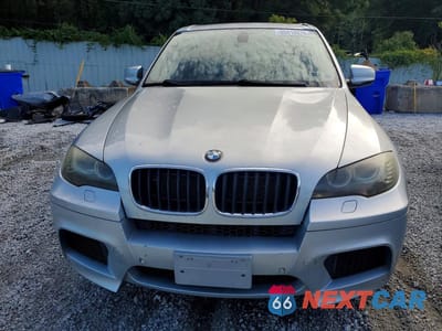 Piąte zdjęcie samochodu w środku: 2010 BMW X5 M VIN:5YMGY0C58ALK25448 - miniatura