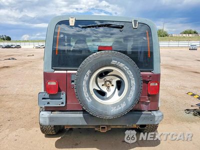 Zdjęcie 6 z 13 samochodu: 2001 JEEP WRANGLER / TJ SPORT VIN:1J4FA49S71P303301 - miniatura