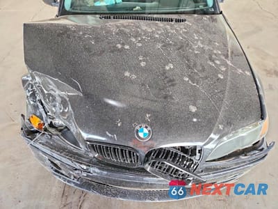 Zdjęcie 11 z 12 samochodu: 2004 BMW 330 I VIN:WBAEV53424KM36620 - miniatura