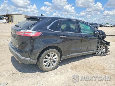 Trzecie zdjęcie samochodu z tyłu: 2019 FORD EDGE TITANIUM VIN:2FMPK3K92KBB54387 - miniatura