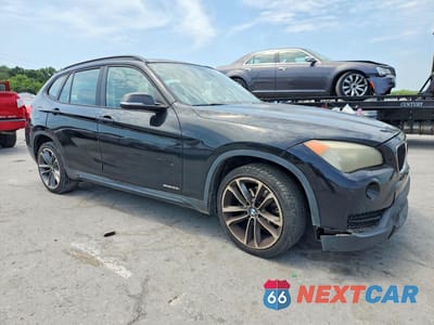 Czwarte zdjęcie samochodu z boku: 2014 BMW X1 SDRIVE28I VIN:WBAVM1C58EVW53383 - miniatura